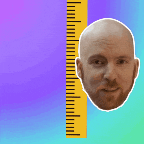 a bald man with a beard is being measured by a ruler that goes up to 12 inches