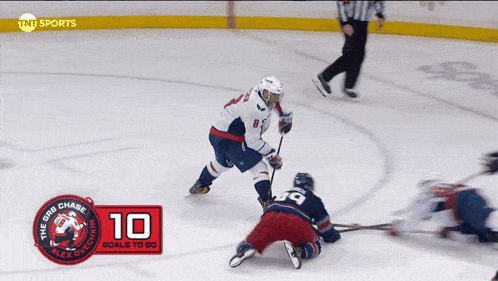 a hockey game is being played and the number 10 is displayed