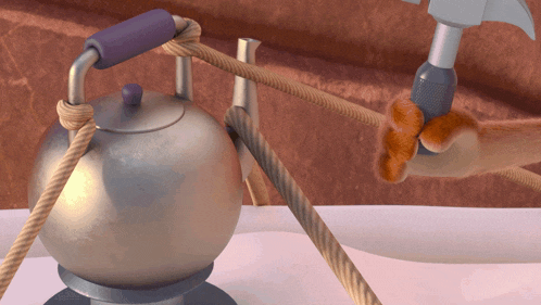 a hammer with a purple handle is being held by a cat