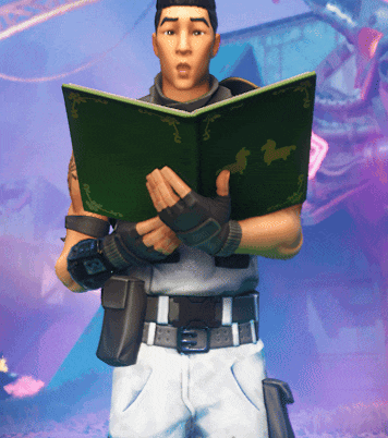 a man holding a green book with a butterfly on it