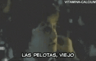 a close up of a person with the words las pelotas viejo on the bottom