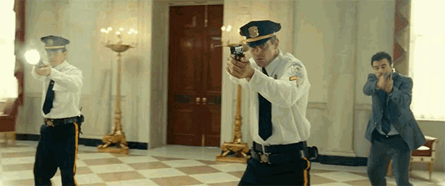 a group of police officers are standing in a room holding guns