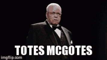 a man in a tuxedo with the words totes mcgotes written below him