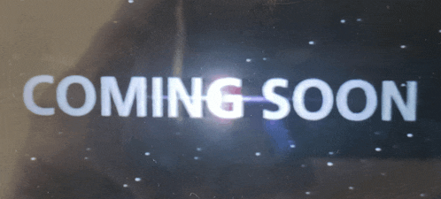 a sign that says coming soon in white letters