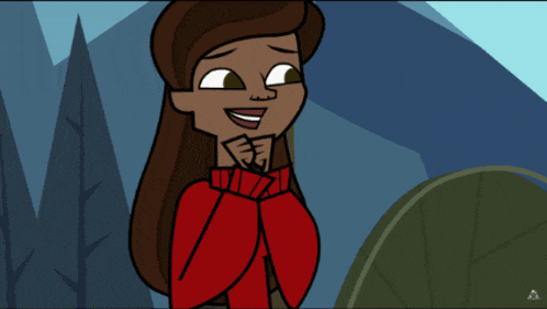 a girl in a red sweater is smiling with her hands on her chin