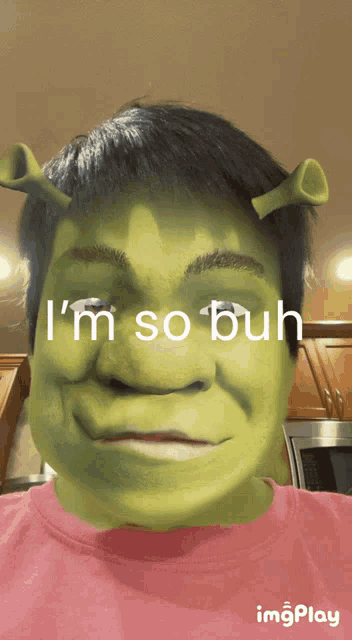 a man with shrek makeup on his face and the words i 'm so buh above him