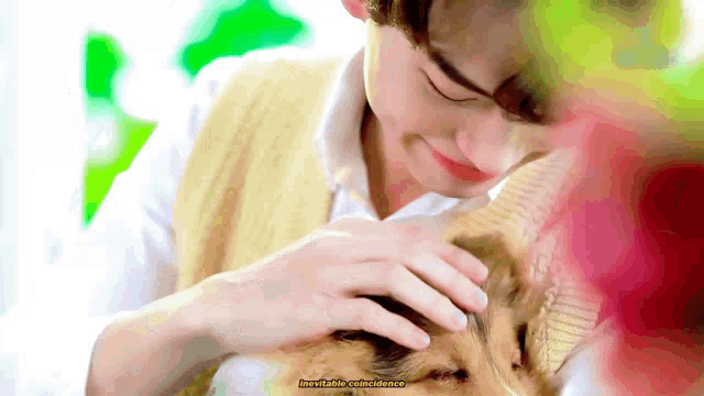 a man petting a cat with the words " inevitable confidence " written on the bottom