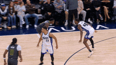 a basketball game is being played on a court that has the word netflix on it