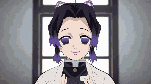 a girl with purple hair is smiling and holding something in her hands
