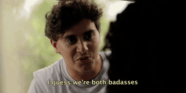 a man in a white shirt says " i guess we 're both badasses "