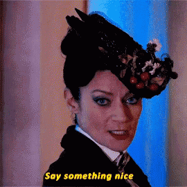 a woman wearing a hat says something nice in yellow letters