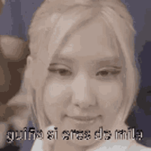 a close up of a woman 's face with the words `` guia si eres de mira '' written on it .
