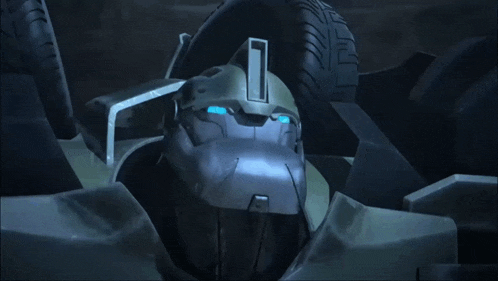 a close up of a robot 's face with blue lights