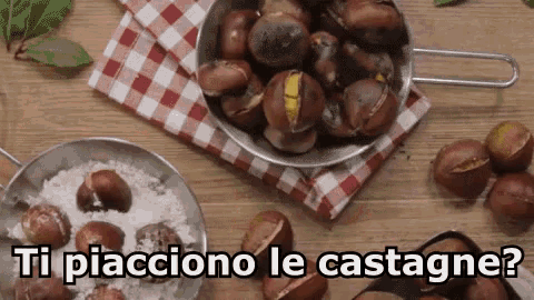 a pan of chestnuts sits on a wooden table next to a bowl of rice and the words ti piacciono le castagne