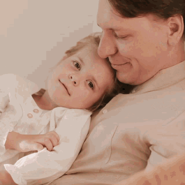 a man and a child are looking at each other through a broken window
