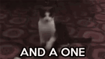 a black and white photo of a dog with the words `` and a two '' written on it .