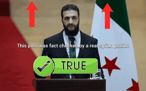 a man in a suit and tie stands at a podium with a check mark and the word true below him