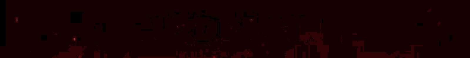 a close up of a red lightning bolt on a black background