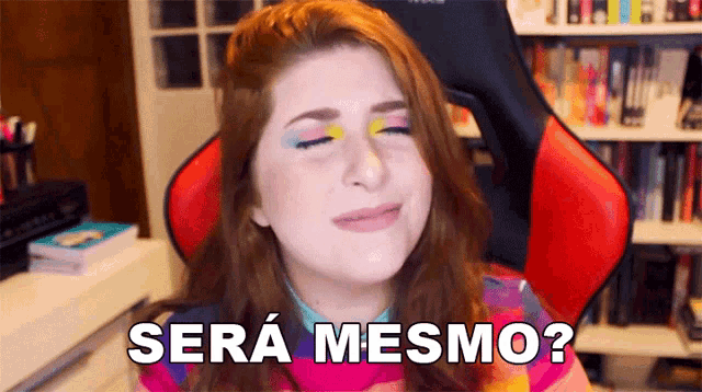 a woman sitting in a chair with her eyes closed and the words sera mesmo on her face