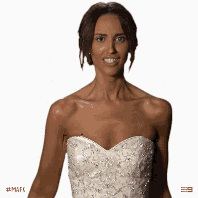 a woman in a white strapless dress with the hashtag # mafs