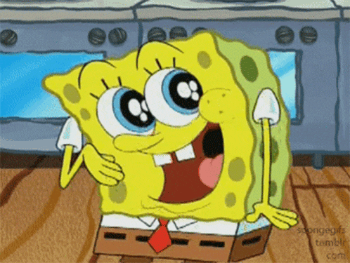 a cartoon character named spongebob is sitting on a wooden table