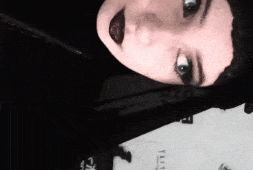 a close up of a woman 's face with the word pro on the bottom