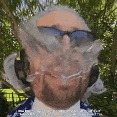 a man with a beard wearing sunglasses and headphones says that george washington gif guy better not make this gif