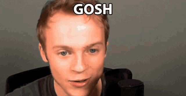 a man with the word gosh written on his forehead