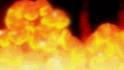 a close up of a fire explosion with a black background .