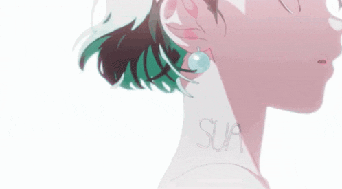 a close up of a person 's face with green hair and earrings .