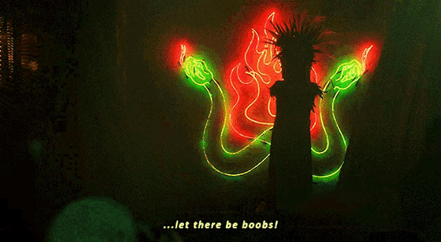 a neon sign that says " let there be boobs " on it