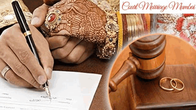 a man is writing on a piece of paper next to a judge 's gavel and wedding rings