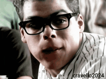 a man wearing glasses and a striped shirt has the year 2024 on the bottom