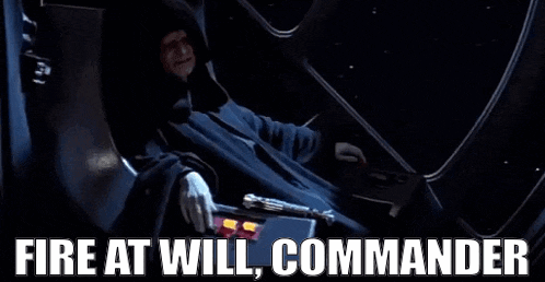 emperor palpatine from star wars is sitting in a chair holding a lightsaber and saying `` fire at will commander ''