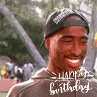 a man wearing a baseball cap and a hoodie is smiling and wishing a happy birthday .