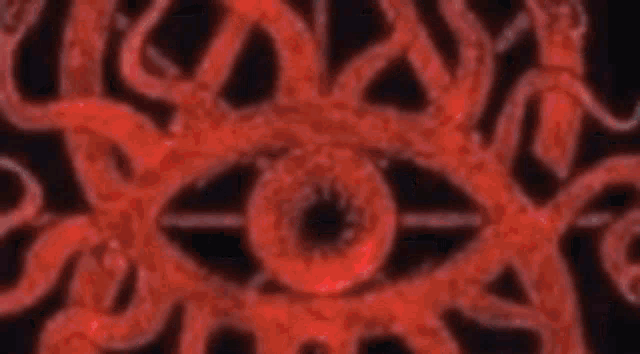 a dark lord black logo with a red circle in the middle
