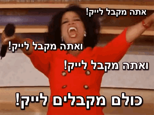 a woman in a red dress is holding a microphone with her arms in the air in a foreign language