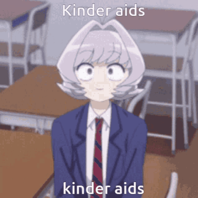 a girl in a suit and tie is sitting in a classroom with the words kinder aids kinder aids written above her