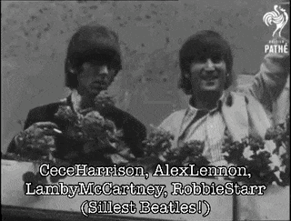 a black and white photo of two men holding flowers .