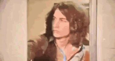 a close up of a painting of a man with long hair