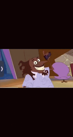 a cartoon character is smiling while holding a cell phone
