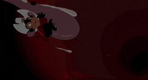 a cartoon character is laying on a bed with a pillow on his head