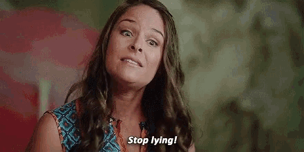 a woman is making a funny face and saying `` stop lying ! ''