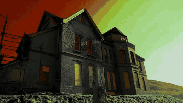 a large house with a sign on the side that says " for sale "