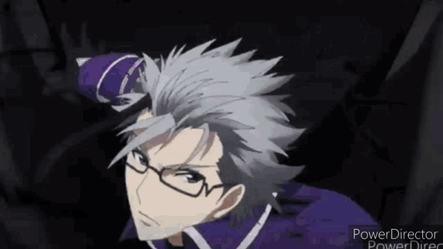 a man with glasses and gray hair is wearing a purple jacket .