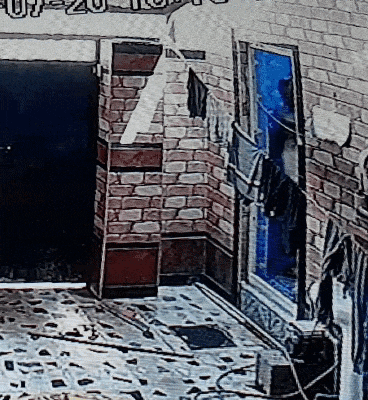 a drawing of a room with a brick wall and a blue window