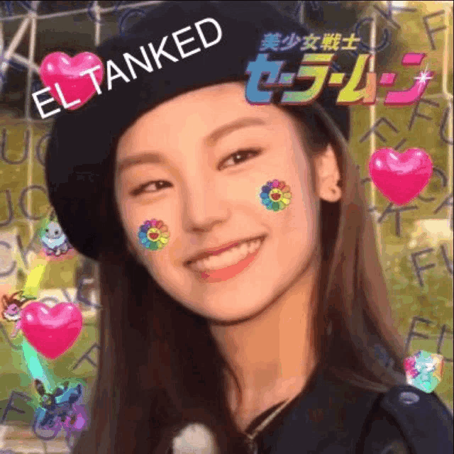 a girl with stickers on her face is wearing a black beret .