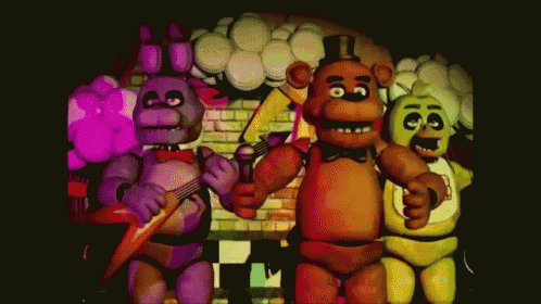 a group of five nights at freddy 's characters standing next to each other .