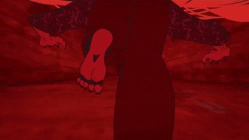 a man with glasses is being attacked by a monster with glowing yellow eyes