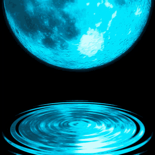 a blue moon with a white spot on it is reflected in a pool of water